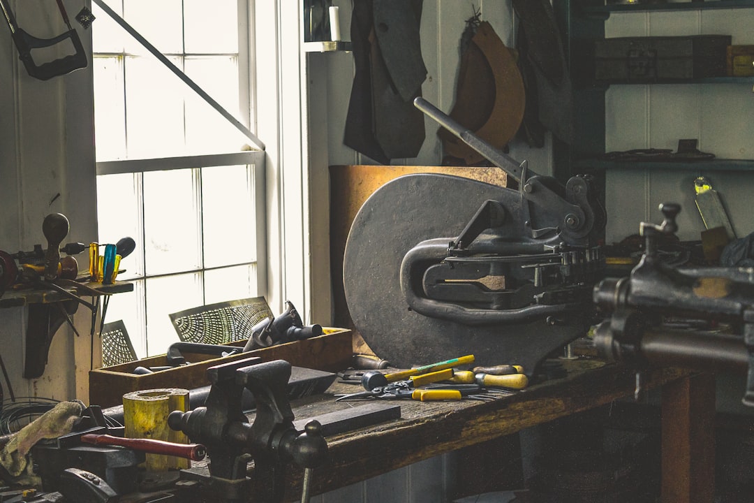 Property maintenance tools and equipment laid out on a clean surface